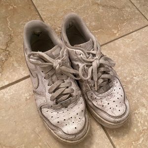 Well-worn ladies nike shoes